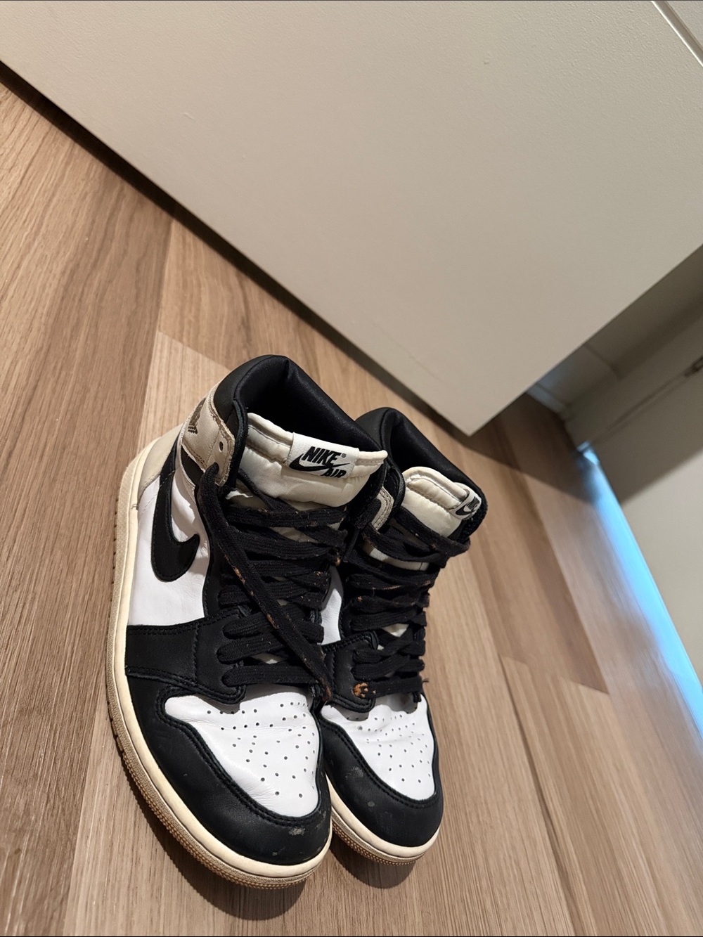 Jordan 1 Nike woman Black and White High-Top Sneakers with Cream Accents
